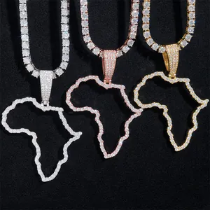 Close-up of iced-out Africa map pendants in silver, rose gold, and gold finishes.