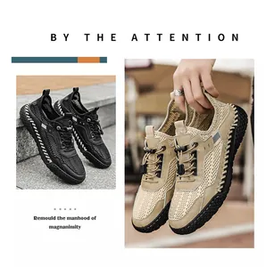 Dettaglio di sneaker da uomo in rete traspirante nei colori nero e kaki con suole cucite