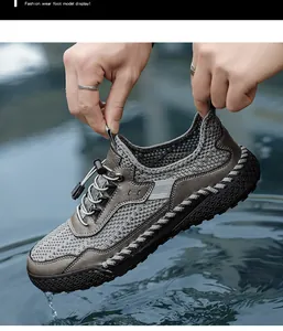 Vista dettagliata di sneaker da uomo in mesh grigio traspirante con chiusura rapida