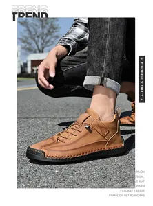Close-up of brown leather casual shoe with hand-stitched sole and retro workwear style