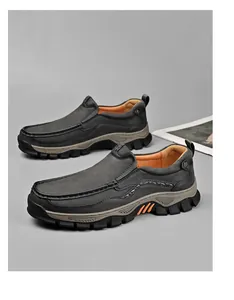 Close-up view of men's gray outdoor casual loafers featuring non-slip thick rubber soles