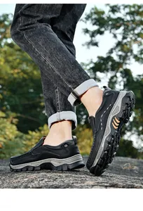 Durable black leather slip-on outdoor work shoes with rugged non-slip sole for men