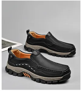 Close-up view of black men's outdoor casual leather slip-on loafers with thick rugged soles