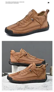 Detail view of brown mid-top leather casual boots with hand-stitched rubber soles.