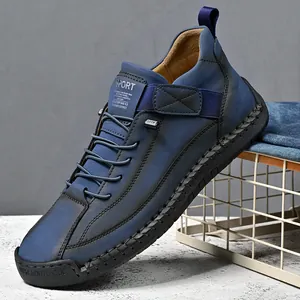 Durable blue men's mid-top casual leather boots with sporty outdoor work style