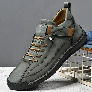 High-quality men's mid-top casual outdoor leather boots in grey with a slip-on style