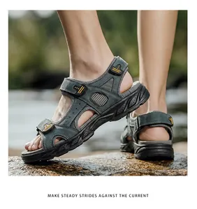 Side view detail of durable men's genuine leather outdoor sandals in grey-green
