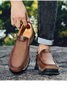 Durable brown men's slip-on outdoor loafers with rugged non-slip rubber soles.