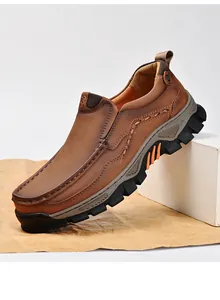 Detailed side view of brown leather slip-on men's casual outdoor shoe with non-slip sole.