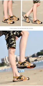 High-quality detail view of men's non-slip closed toe beach sandals on a sandy beach