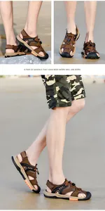 Detail of men's brown closed-toe beach sandals shown in an outdoor beach setting