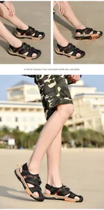 Detailed beach scene showing men's protective closed-toe sandals on sand