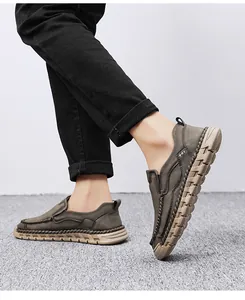 Men's slip-on loafers in brown leather with handmade stitching and durable soft soles