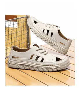 Detailed view of men's breathable hollow-out beach sandals with soft soles in cream
