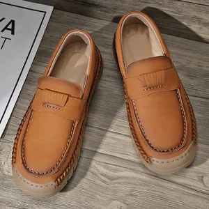 Men's retro handmade brown leather loafers with soft soles and stylish vintage fringe