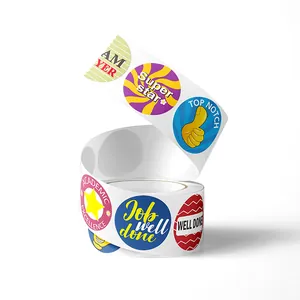 Detail macro view of English reward sticker roll with various colorful motivational designs