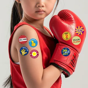Close-up of vibrant English reward stickers for kids on a child's arm and glove