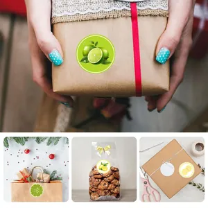 Versatile round lemon and lime stickers for gift wrapping and food packaging