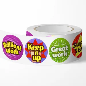 Close-up of colorful reward stickers on a roll with encouraging English phrases for kids.
