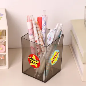 Close-up of colorful Super Star and Terrific reward stickers applied on a desk pen holder