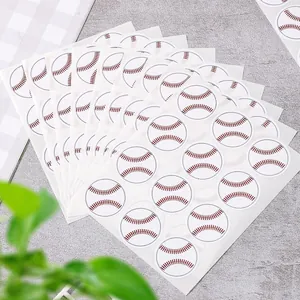 Detailed view of multiple sheets of baseball-themed round self-adhesive stickers.