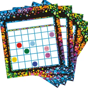 Close-up of colorful smiley face reward stickers on a decorative grid card for kids