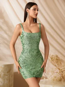 Elegant green sequined mini dress featuring vintage floral patterns and a bodycon fit.