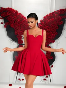 Stunning red backless short evening dress with flared skirt for parties and events.