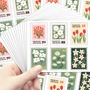 Gedetailleerd overzicht van florale bedankstickers in postzegelvorm voor geschenkdozen