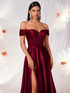 Elegant burgundy off-the-shoulder matte satin evening gown with high slit and draping