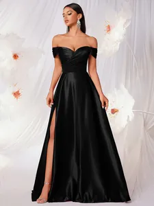 Elegant black matte satin off-shoulder evening gown with a high leg slit detail.