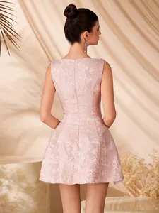 Back view of an elegant pink jacquard sleeveless mini dress with A-line silhouette