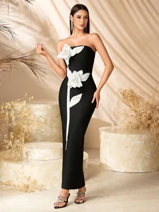 Elegant black and white strapless evening gown with 3D floral accents for formal banquets