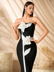 Elegant black and white strapless tube dress featuring 3D white floral accents for parties