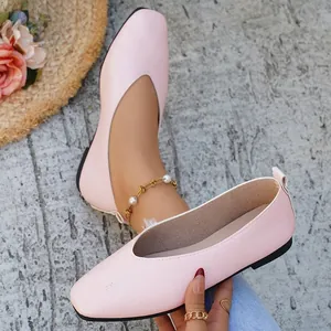 Detailed view of pink textured square toe ballet flats for women with minimalist design