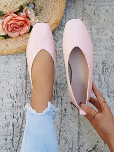 Elegant light pink square-toe ballet flats for women in a minimalist vintage style