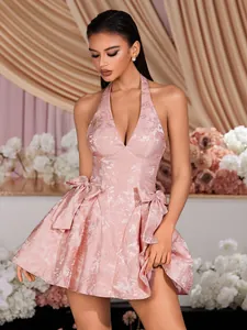 Elegant pink jacquard halter dress featuring a deep V-neck and large bow decorations