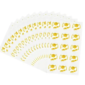 Gold graduation mortarboard and diploma stickers for party favors and envelopes