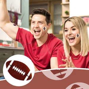 Detailed view of American football stickers on sports fans' faces for themed parties.