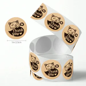 Rol kraftpapier kattenstickers met een diameter van 2,5 cm en Thank You-tekst.