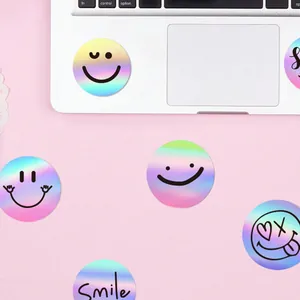Close-up of holographic smiley face stickers with colorful gradient finish