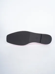 Detailed close-up of the black anti-slip rubber outsole on women's pink loafers shoes