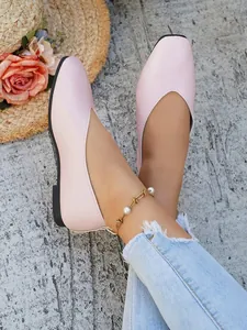 Detailed view of elegant pink vintage square toe flat shoes for women in summer