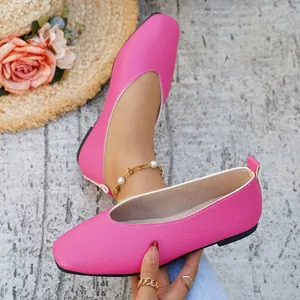 Detailed view of pink textured faux-leather minimalist square toe ballet flats for summer