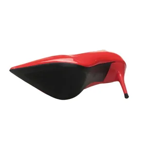 Detail showing the red patent leather finish and black non-slip sole of these stiletto heels
