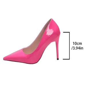 Side detail of pink patent leather pointed-toe pumps with a 10cm stiletto heel