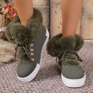Stylish women's olive green platform snow boots featuring thick warm faux fur trim and lace-up design