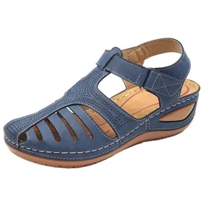 Vintage navy blue closed-toe wedge sandals with hollow-out design and platform sole