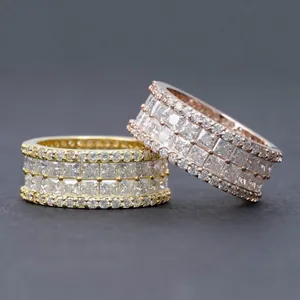 Close-up of hip-hop 925 silver rings with full pavé princess cut moissanite stones