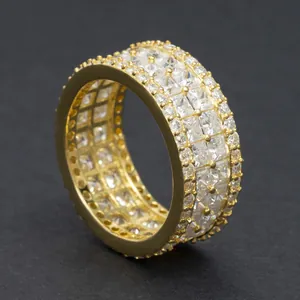 Detailed macro view of a gold-plated 925 silver ring with princess-cut moissanite.